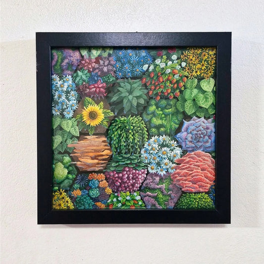 a painting of a honeycomb patterned vertical garden. the garden includes mushrooms, sunflowers, strawberries, daisies, succulents, grapes, moss etc. the painting is framed in a modern black square frame.